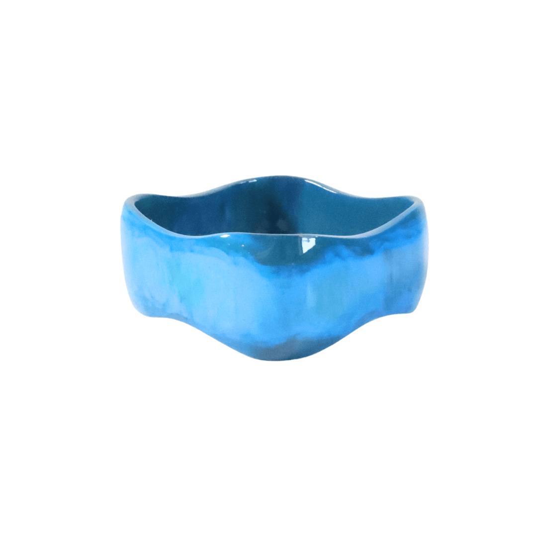 Blue ceramic bowl on a white background
