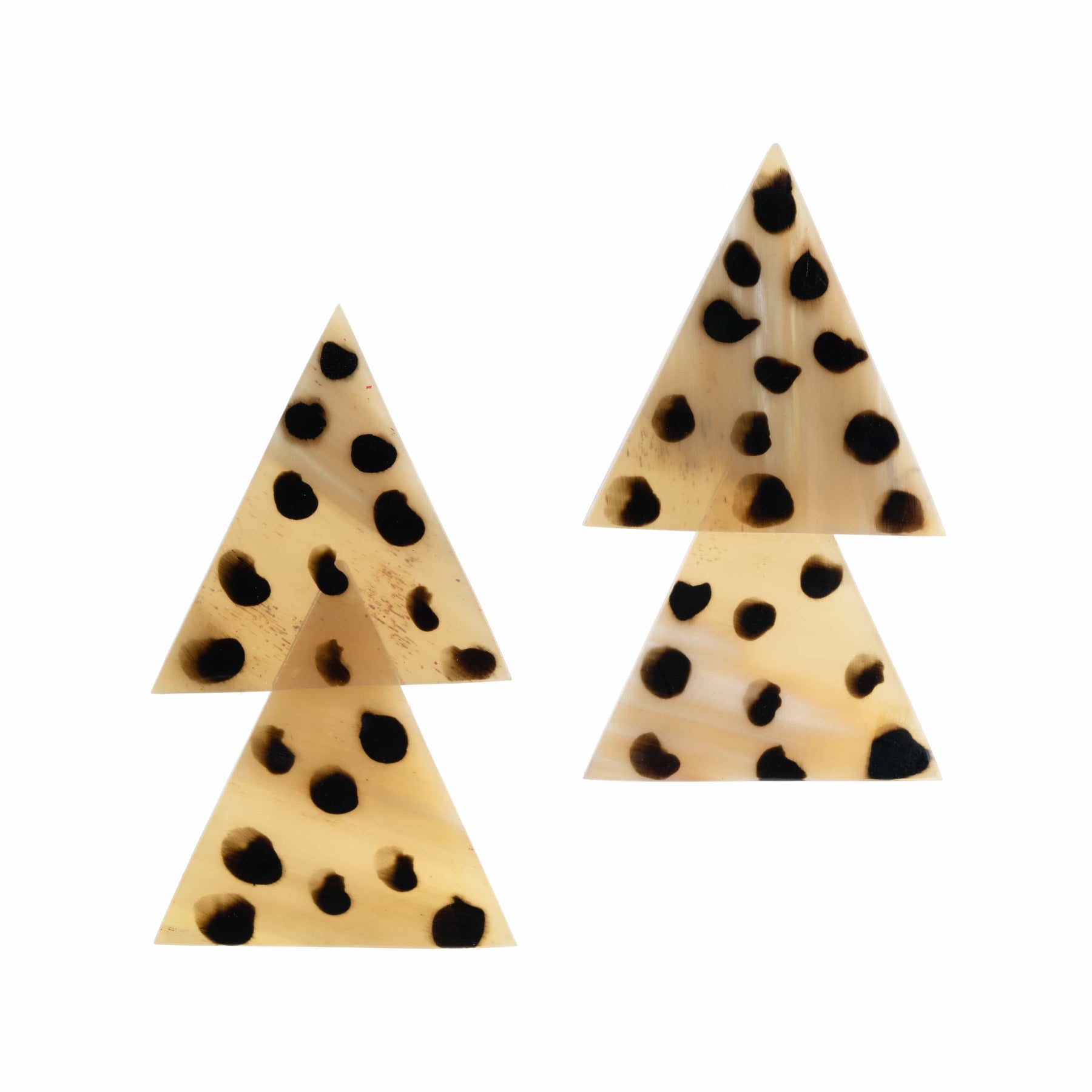 A pair of cheetah print earrings with a geometric triangular shape, featuring black dots on a beige background.