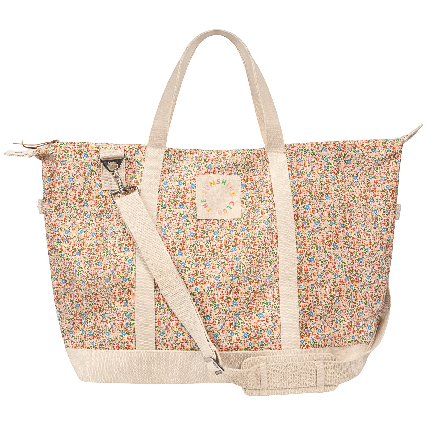 Floral-patterned tote bag with a strap on a white background