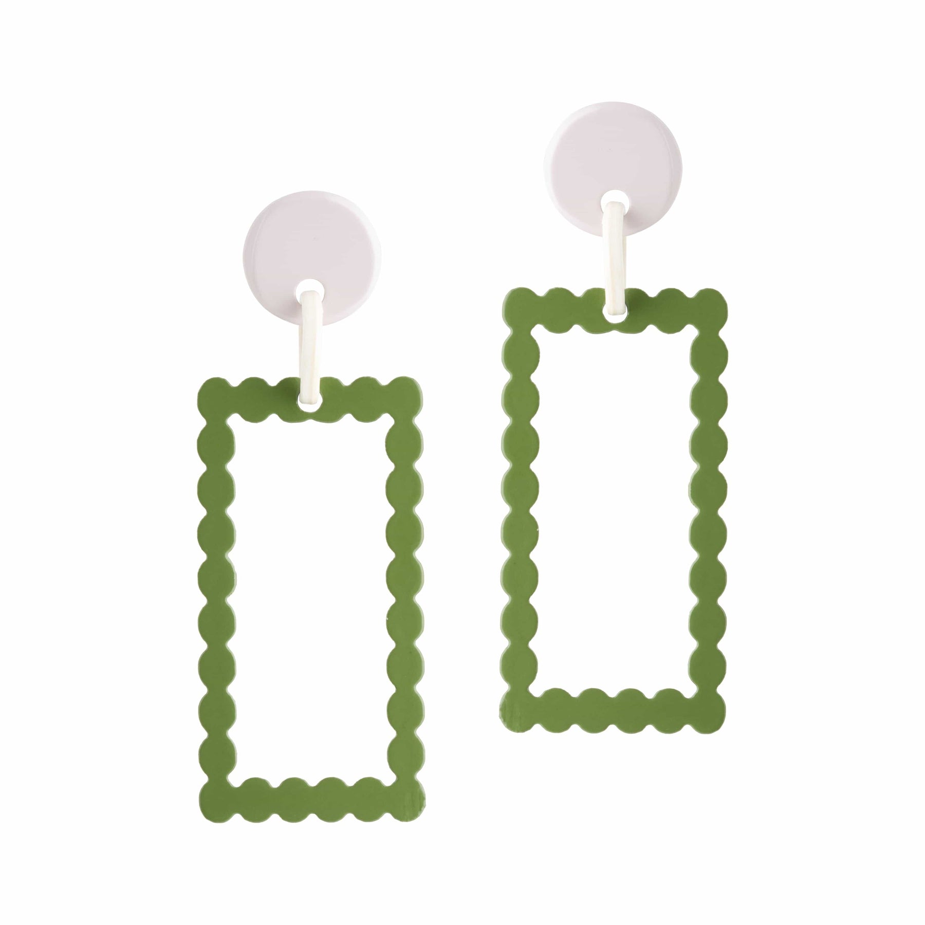 A pair of green and white colorblock earrings with a geometric rectangular design and small green dots along the edges.