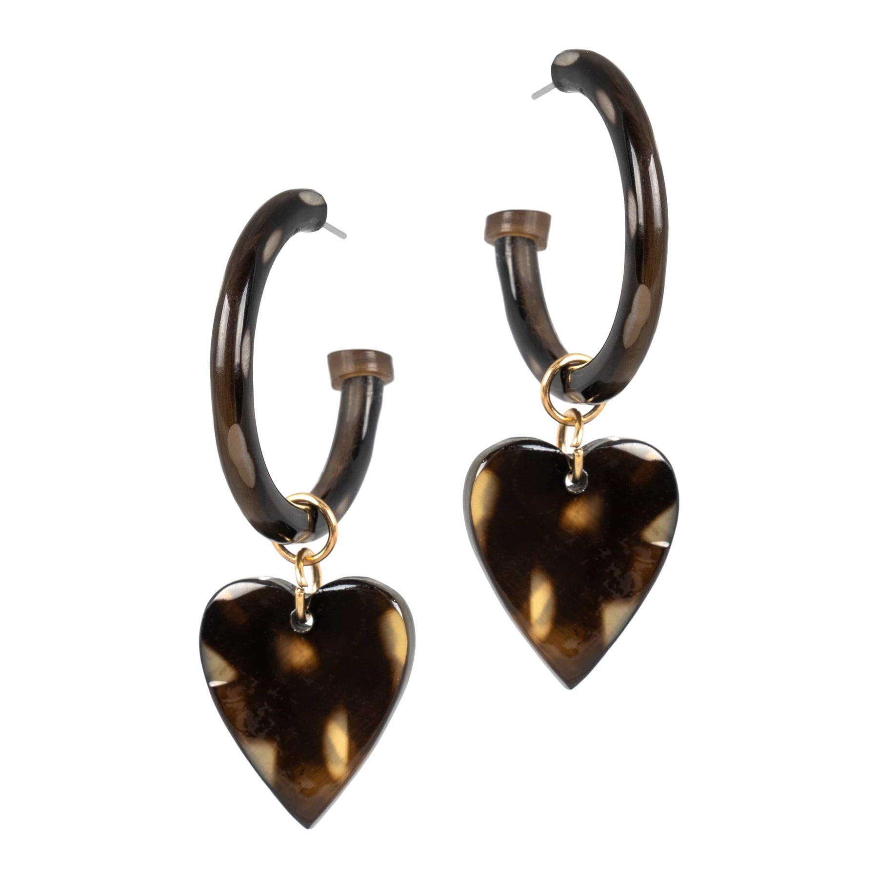 Tortoiseshell heart-shaped earrings on a white background