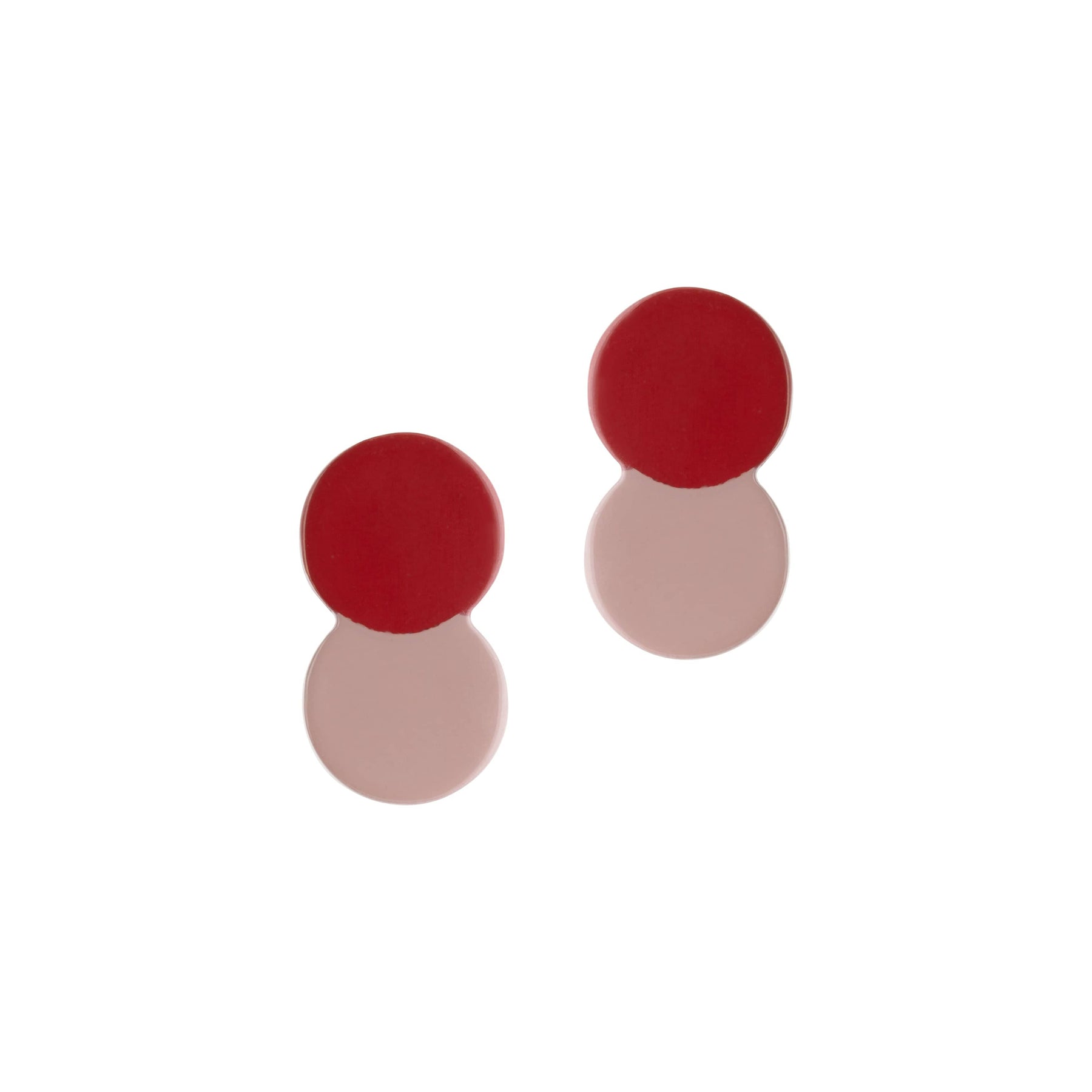 A pair of burgundy and pink double circle earrings on a white background