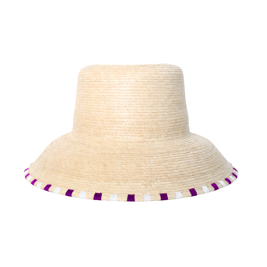 Beige straw hat with purple and white band on a white background