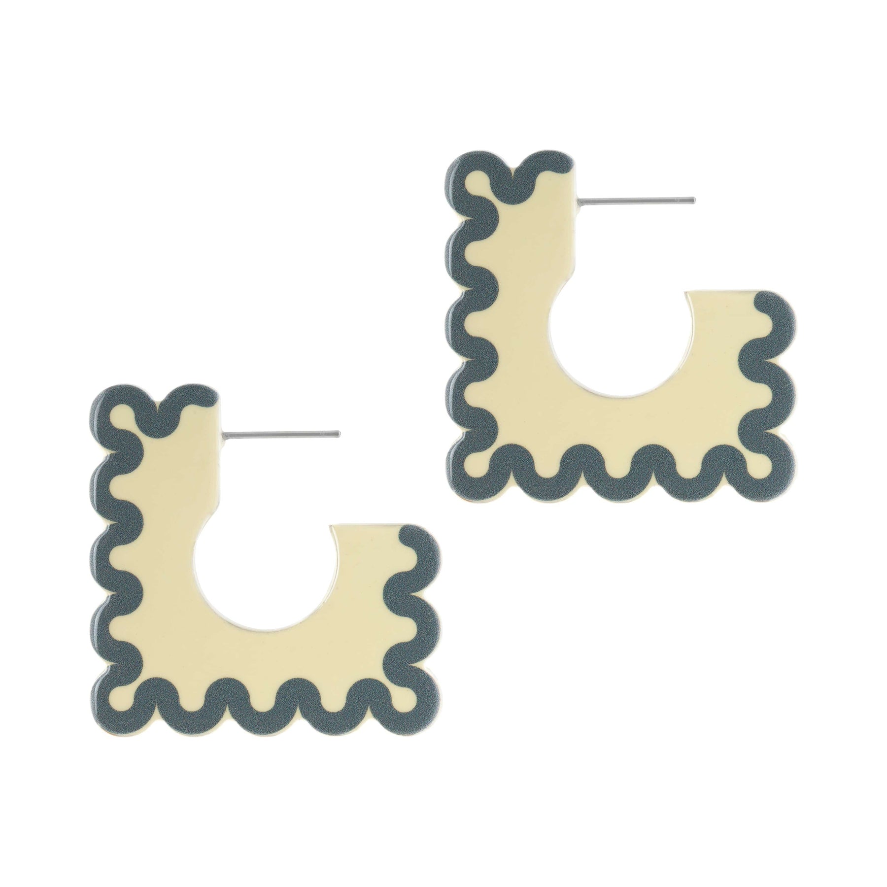 A pair of square-shaped earrings with a creamy ivory base and a striking dark teal squiggle outline.